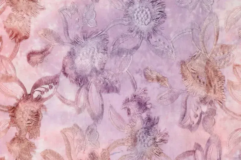Broderie-stof-tie-dye-swingende-bloemenprint-y308