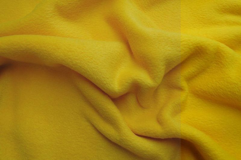 Fleece stof geel. FL035