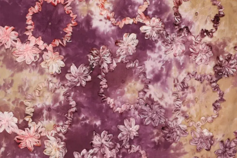 Tie-dye-broderie-stof-geborduurd-lint-P474