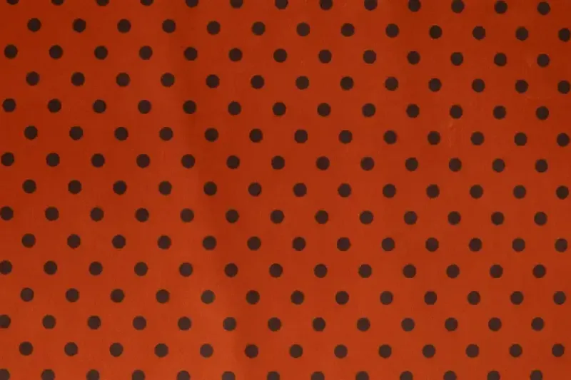Velours stof, stip print, oranje/bruin. A.036-1