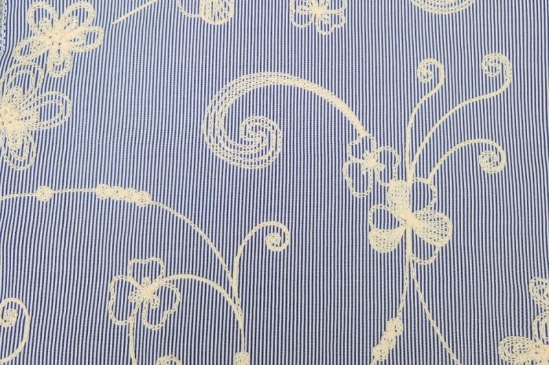 Katoen-broderie-stof-sierlijke-krullen-p569