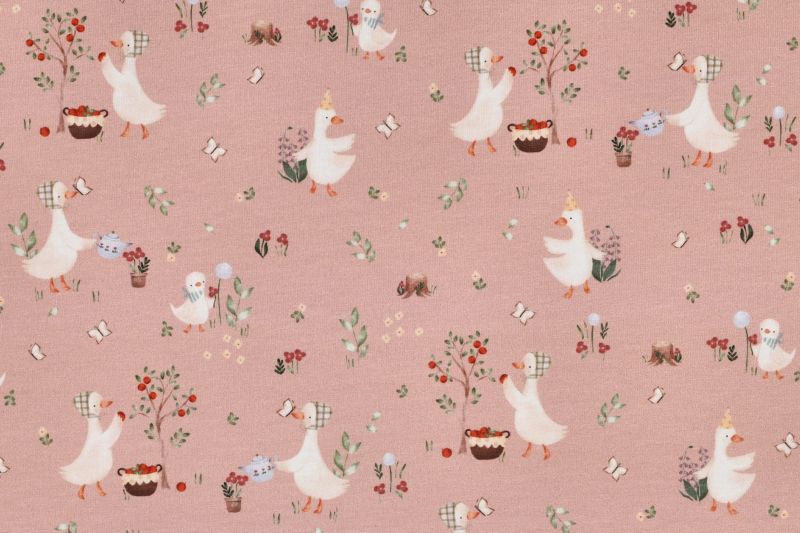 Jersey stof, GOTS, ganzen en bloemen motief, roze. A.154-1