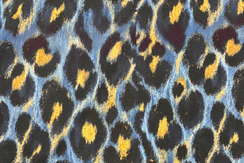 Tricot katoen stof, abstracte print, geel/blauw/zwart. Actie50-1