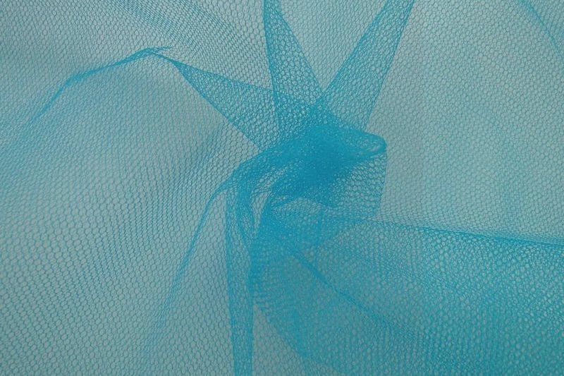 Tule stof aqua blauw