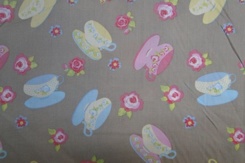 Dapper kinderstof beige theekopjes Print