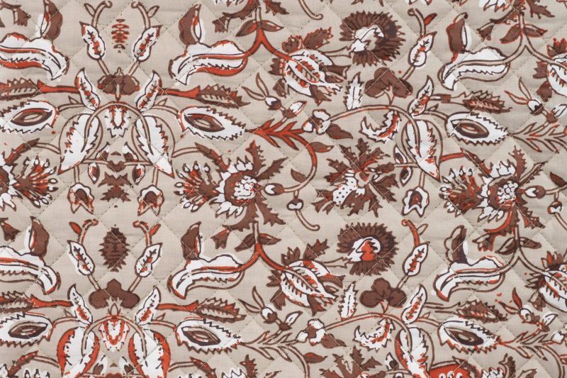 Gewatteerde stof, bladeren print, bruin/crème/oranje. A.205-1