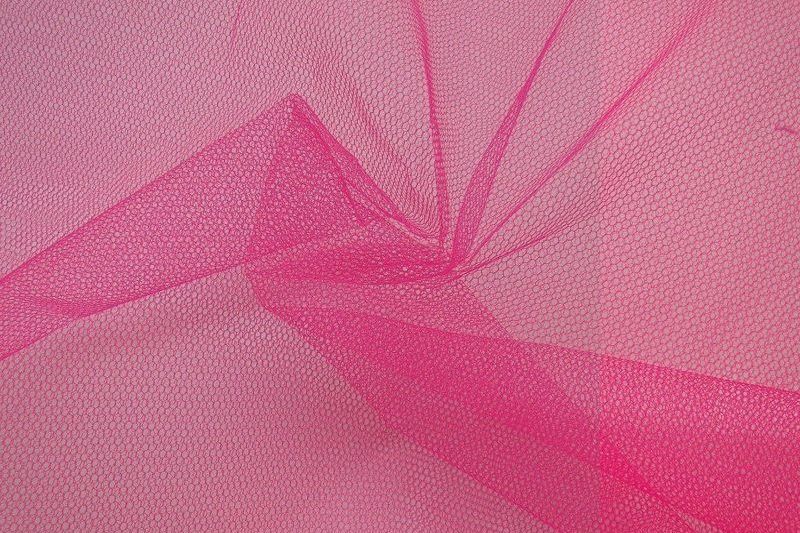 TIJDELIJK UITVERKOCHT Tule stof fluor roze