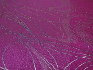 Lycra stof roze met zilver draad motief