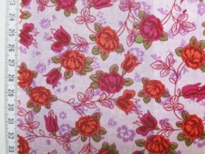 Quilt stof roze met oranje/fuchsia bloemen