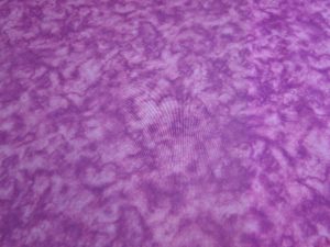 Quilt stof licht cerise/fuchsia met tie dye print