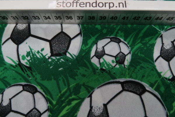 Texture stof, voetbal print, groen zwart wit