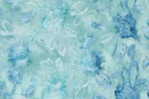 Broderie-stof-tie-dye-swingende-bloemenprint-y307