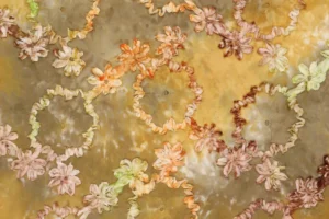 Tie-dye-broderie-stof-geborduurd-lint-P475