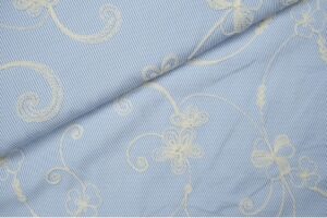 Katoen-broderie-stof-sierlijke-krullen-p570