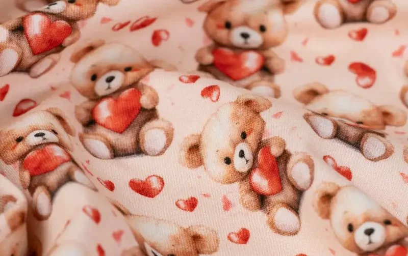 Jersey stof, beertjes print, roze/bruin/rood. A.075-5